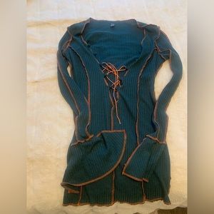 Green dress with orange strings